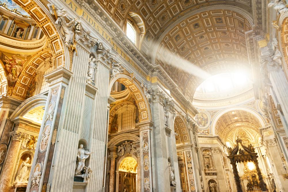 The nave fills with light in the late afternoon. With the extended nave, the basilica now has the largest interior volume of any in the world and can accommodate 60,000 people. (gillmar/Shutterstock)