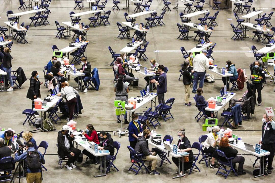 2021 COVID-19 Recap: 200 Million Vaccinated, 450,000 Dead