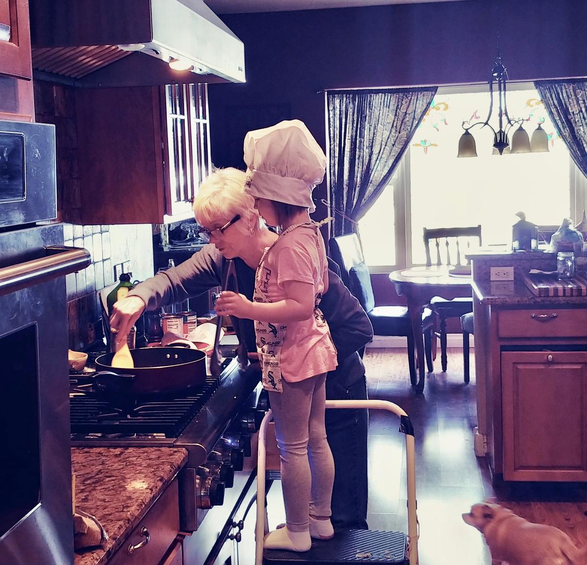 Everly Rose, the author's granddaughter, learns to make a family staple. (Courtesy of Linda Johnson)