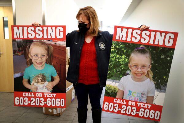 Manchester Police Public Information Officer Heather Hamel holds reward posters of murder victim Harmony Montgomery after she was reported missing, in Manchester, N.H., on Jan. 4, 2022. (John Tlumacki/The Boston Globe via AP)