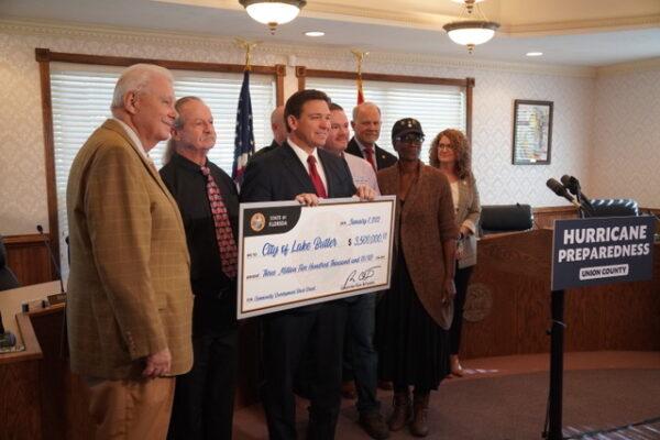 Florida Gov. Ron DeSantis awards $3.5 million Jan. 7 to the rural Florida city of Lake Butler to fix wastewater infrastructure. (Nanette Holt/The Epoch Times)