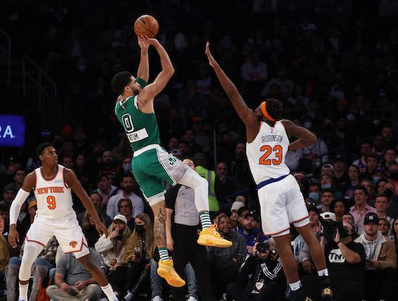 Jayson Tatum #0 of the Boston Celtics shoots against Mitchell Robinson #23 of the New York Knicks during their game at Madison Square Garden, in New York City, on Jan. 6, 2022. (Al Bello/Getty Images)