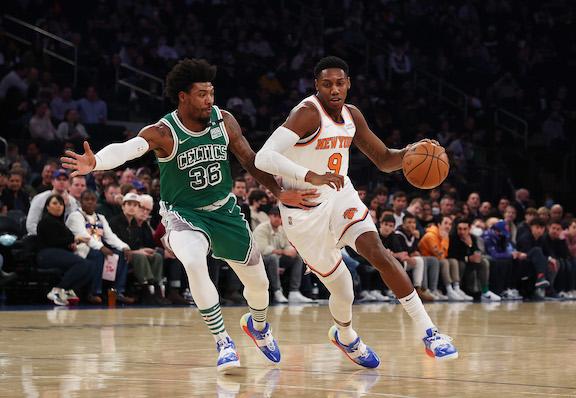 RJ Barrett #9 of the New York Knicks drives against Marcus Smart #36 of the Boston Celtics during their game at Madison Square Garden, in New York City, on Jan. 6, 2022. (Al Bello/Getty Images)