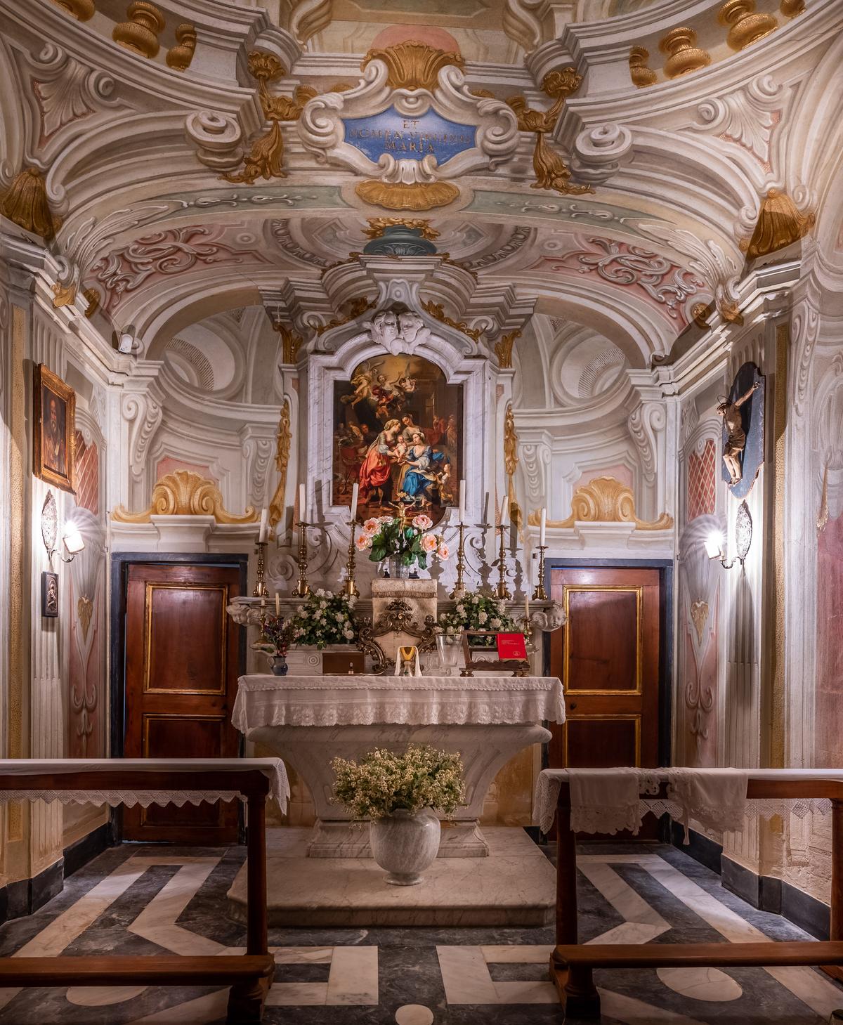 A chapel inside the villa features hand-painted frescoes and fine marble accents. (Courtesy of Savills)