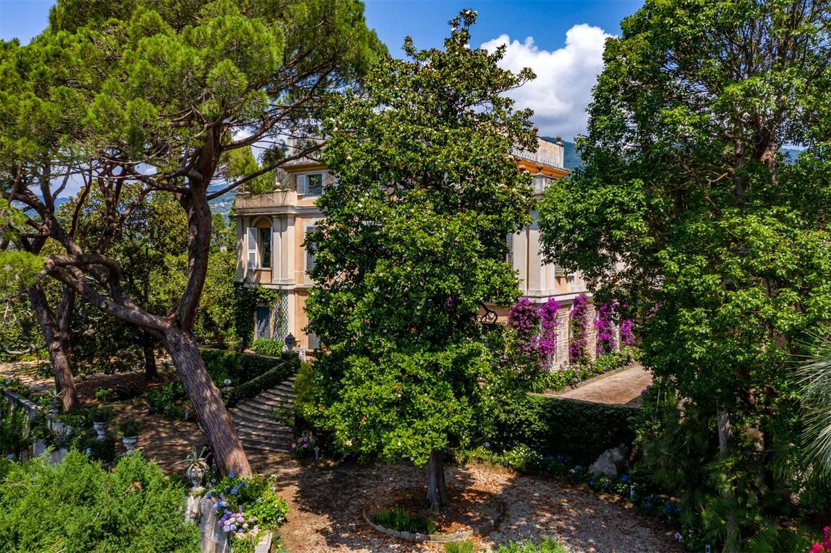 The villa grounds are a Mediterranean paradise, creating a sense of a private, luxurious world. (Courtesy of Savills)