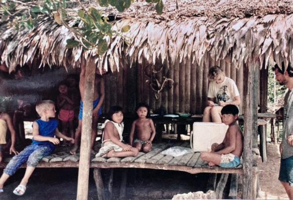An inoculation clinic in a village on the Amazon River. (Courtesy of David Warner)