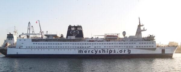 The Africa Mercy, docked in Senegal, is a 499-foot former railroad ferry converted into the world’s largest civilian hospital ship. (Courtesy of David Warner)