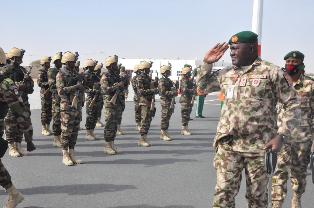 In a photo provided by the Multinational Joint Task Force in the region of Lake Chad force commander Maj. Gen. Abdul Khalifah Ibrahim, paid tribute to the six MNJTF soldiers who were killed in the line of duty, whom he described as martyrs for freedom, on Dec. 29, 2021. (MNJTF)
