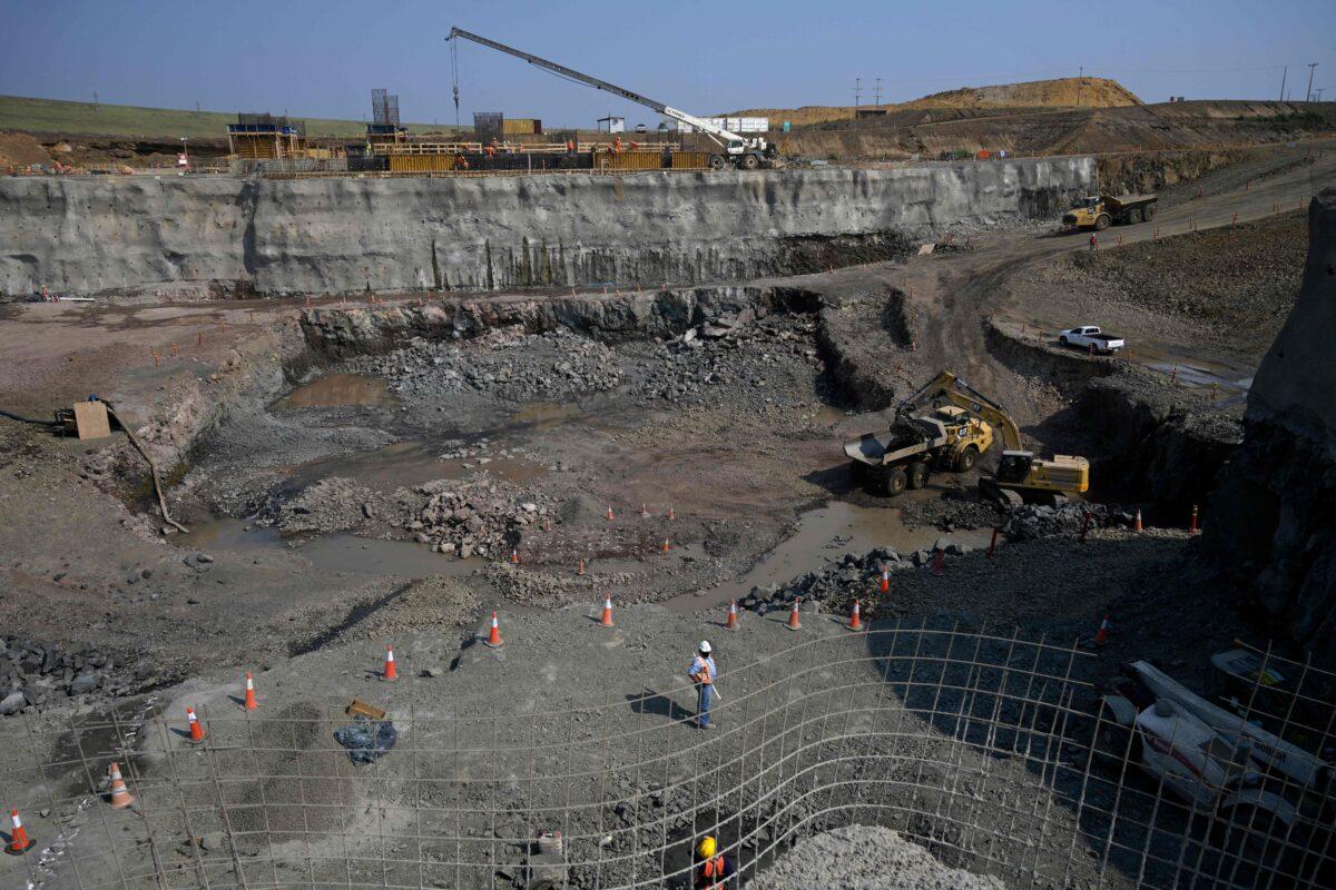 View of the construction site to place 3 turbines at Ana Cua arm of the Binational Yacyreta hydroelectric dam in Yacyreta, Itapua, Paraguay on Aug. 18, 2021. (JUAN MABROMATA/AFP via Getty Images)