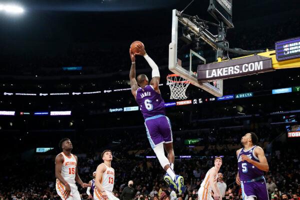 LeBron James #6 of the Los Angeles Lakers dunks against the Atlanta Hawks in the second half at Crypto.com Arena, in Los Angeles, on Jan. 7, 2022. (Meg Oliphant/Getty Images)