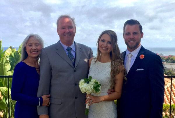 (L–R) Linda and Stephen Judge pose with Stephen's daughter, Caitlin, and her husband, Jeff, at their 2016 wedding. (Courtesy of Caitlin Judge)