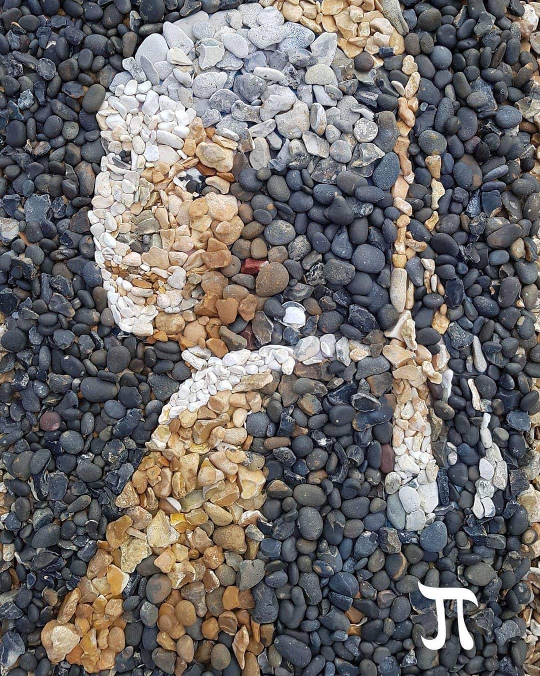 A painting in rock after Vermeer's Girl with the Pearl Earring. (Courtesy of <a href="https://www.facebook.com/justin.bateman1">Justin Bateman</a> and <a href="https://www.instagram.com/pebblepicassos/">@pebblepicassos</a>)