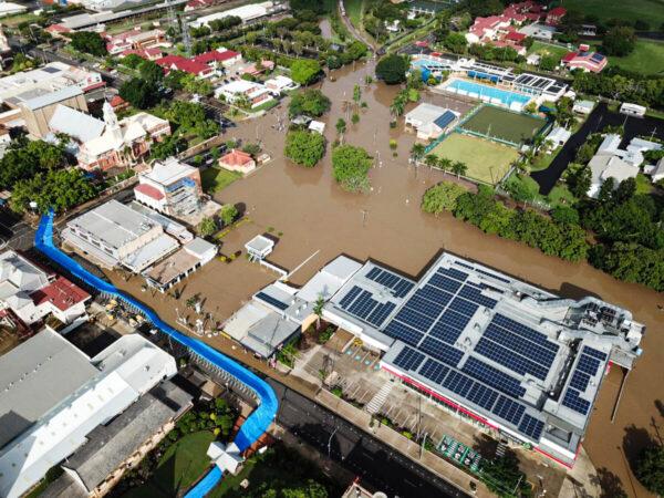 An aerial view of floodwaters impacting the CBD of Maryborough, north of Brisbane, Australia, in the wake of former tropical cyclone Seth. (AAP Image/Supplied by Jade Wellings)