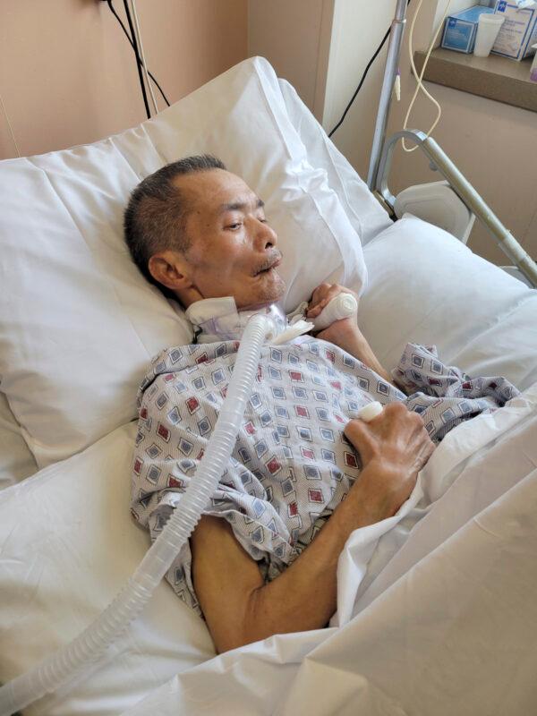 Chinese immigrant Yao Pan Ma in the hospital on Oct. 27, 2021, after he was attacked in April while collecting cans in the East Harlem neighborhood in New York. (Karlin Chan via AP)