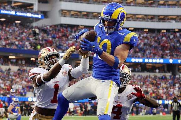 Cooper Kupp #10 of the Los Angeles Rams catches the ball for a touchdown in the fourth quarter of the game against the San Francisco 49ers at SoFi Stadium, in Inglewood, Calif., on Jan. 9, 2022. (Harry How/Getty Images)
