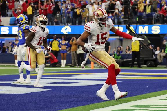 Jauan Jennings #15 of the San Francisco 49ers runs the ball into the end zone for a touchdown in the fourth quarter of the game against the Los Angeles Rams at SoFi Stadium, in Inglewood, Calif., on Jan. 9, 2022. (Harry How/Getty Images)