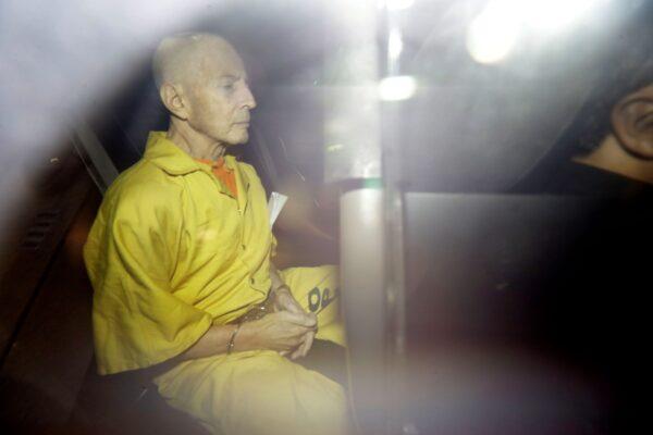 Robert Durst leaves Federal Court in an Orleans Parish Sheriff's vehicle after his arraignment, in New Orleans, on April 14, 2015. (Gerald Herbert/AP Photo)
