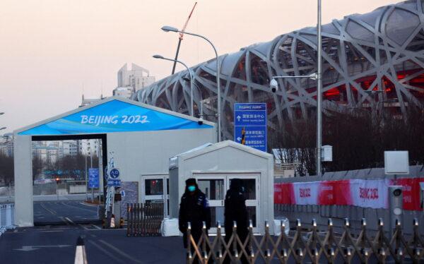 A checkpoint in front of the National Stadium, also known as the Bird's Nest, where the opening and closing ceremonies of the Beijing 2022 Winter Olympics will be held on Jan. 11, 2022. (Fabrizio Bensch/Reuters)