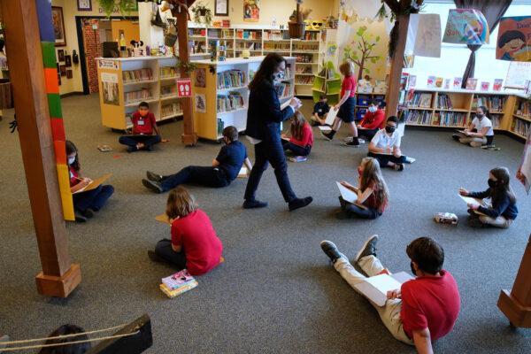 Students at a reading class in the library at Freedom Preparatory Academy in Provo, Utah, on Feb. 10, 2021. (George Frey/Getty Images)