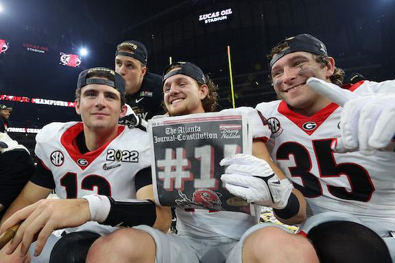 Georgia Bulldogs players celebrate after the Georgia Bulldogs defeated the Alabama Crimson Tide 33-18 in the 2022 CFP National Championship Game at Lucas Oil Stadium, in Indianapolis, on January 10, 2022. (Kevin C. Cox/Getty Images)