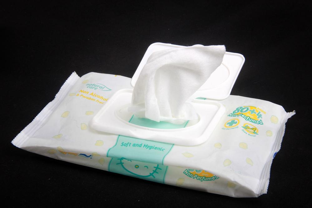 Baby wipes are surprisingly effective because they contain very little moisture, have gentle cleaning agents, and dry quickly. (spotters_studio/Shutterstock)