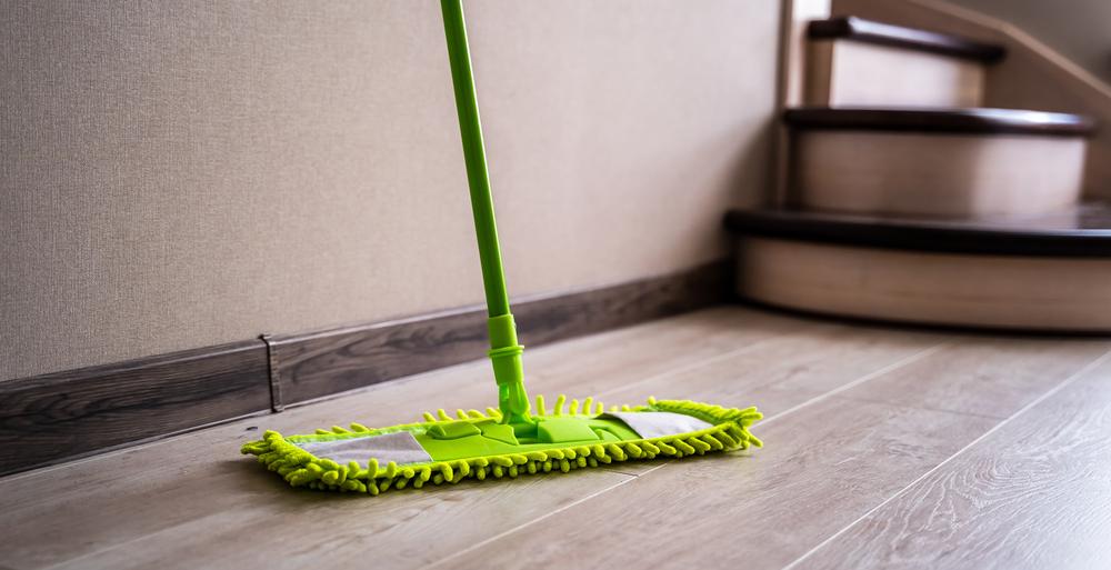 A microfiber mop with an extension pole dusts ceilings and walls quickly and easily. (Terelyuk/Shutterstock)