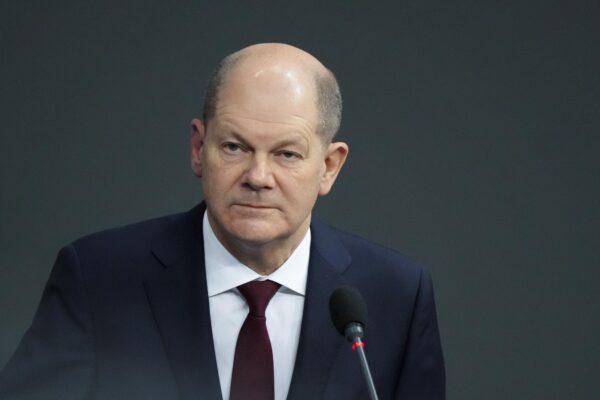German Chancellor Olaf Scholz answers questions during a session of the Bundestag in Berlin on Jan. 12, 2022. (Markus Schreiber/AP Photo)
