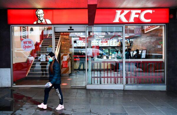 A person walks past a KFC outlet in Melbourne, Australia, on July 15, 2020. (William West/AFP via Getty Images)