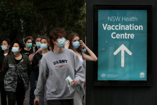 People arrive to be vaccinated at the New South Wales Health mass vaccination hub at Homebush in Sydney, Australia, on Aug. 23, 2021. (Lisa Maree Williams/Getty Images)