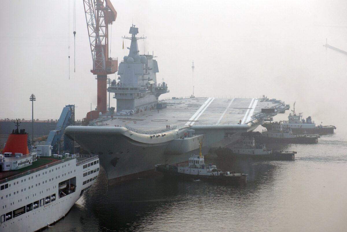 China's first home-built aircraft carrier sets out from a port of Dalian Shipbuilding Industry Co. Shipyard for sea trials on May 13, 2018 in Dalian, Liaoning Province of China. (Getty Images)