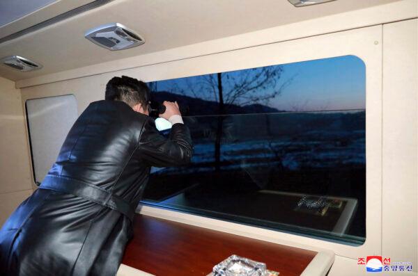 This photo provided by the North Korean government shows North Korean leader Kim Jong Un watches what it says a test launch of a hypersonic missile on Jan. 11, 2022 in North Korea. The content of this image is as provided and cannot be independently verified. (Korean Central News Agency/Korea News Service via AP)