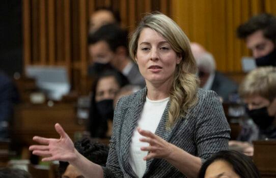 Foreign Affairs Minister Melanie Joly rises during Question Period in Ottawa on Dec. 7, 2021. (Adrian Wyld/The Canadian Press)