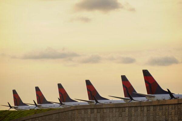 Delta Air Lines 737 passenger planes are seen lined up on a runway at Atlanta Hartsfield-Jackson International Airport in Atlanta, on March 21, 2020. (Elijah Nouvelage/Reuters)