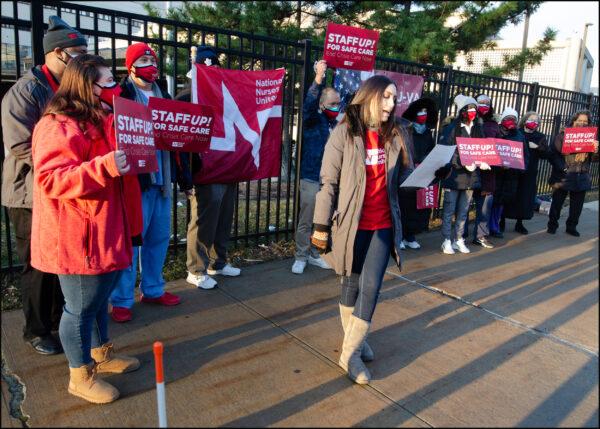Medical-surgical nurse Carissa Coccimiglio reads her prepared statement at the National Nurses United rally in front of the Brooklyn VA Medical Center on Jan. 13, 2022. (Dave Paone/The Epoch Times)