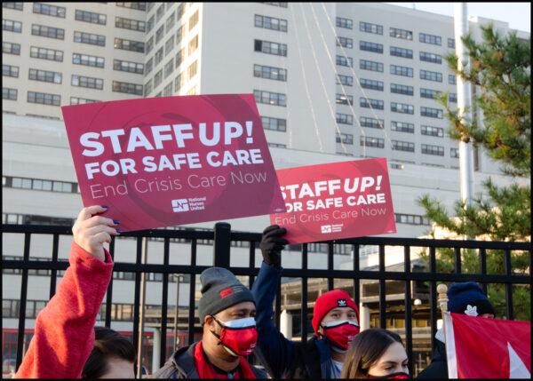 Members of National Nurses United rally in front of the Brooklyn VA Medical Center for the alleviation of staffing shortages at VA hospitals nationwide, on Jan. 13, 2022. (Dave Paone/The Epoch Times)