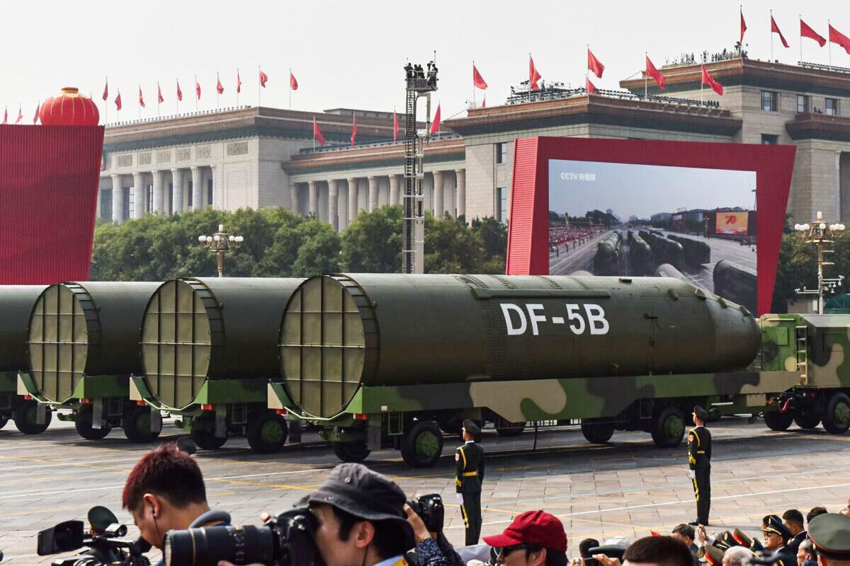 Military vehicles carrying DF-5B intercontinental ballistic missiles participate in a military parade at Tiananmen Square in Beijing on Oct. 1, 2019. (Greg Baker/AFP via Getty Images)