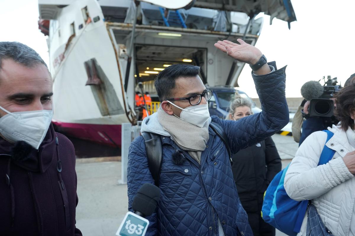 Kevin Rebello, brother of Russel Rebello, a waiter who died in the shipwreck of the Costa Concordia cruise ship, arrives in the tiny Tuscan island of Isola del Giglio, Italy, on Jan. 12, 2022. (Andrew Medichini/AP Photo)