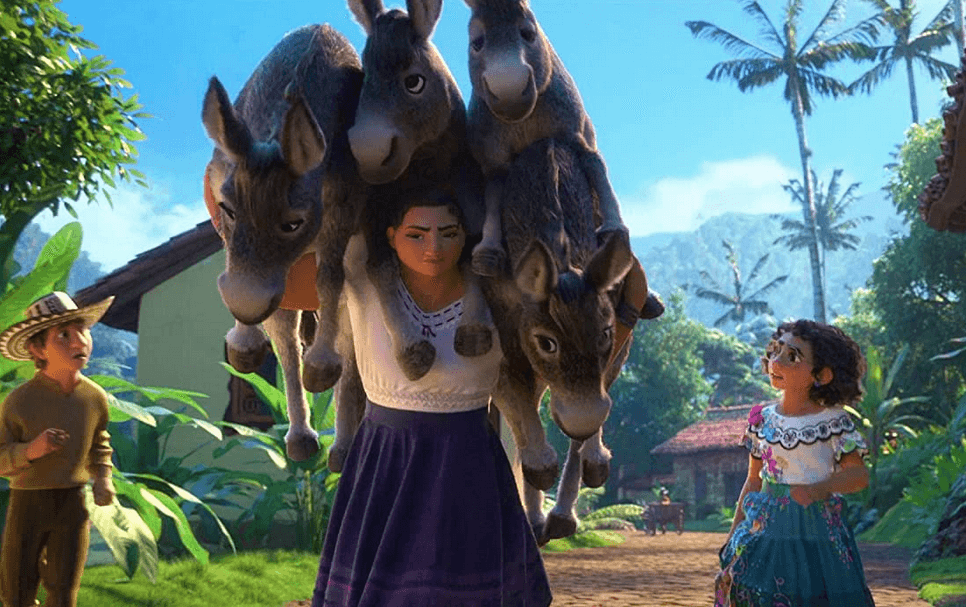 Mirabel's big sister Luisa Madrigal (voiced by Jessica Darrow) carrying donkeys as ... a workout? And Mirabel (voiced by Stephanie Beatriz), in "Encanto." (Walt Disney Animation Studios)