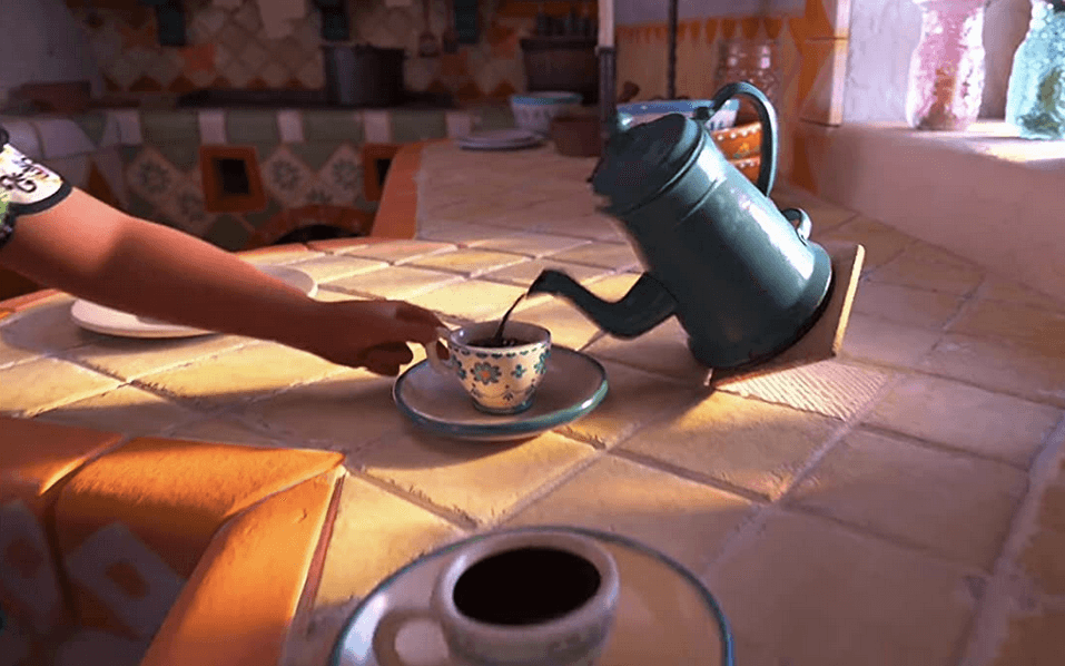 Mirabel (voiced by Stephanie Beatriz) is served good Colombian coffee by her magical casa, which tips up tiles to facilitate such services, in "Encanto." (Walt Disney Animation Studios)