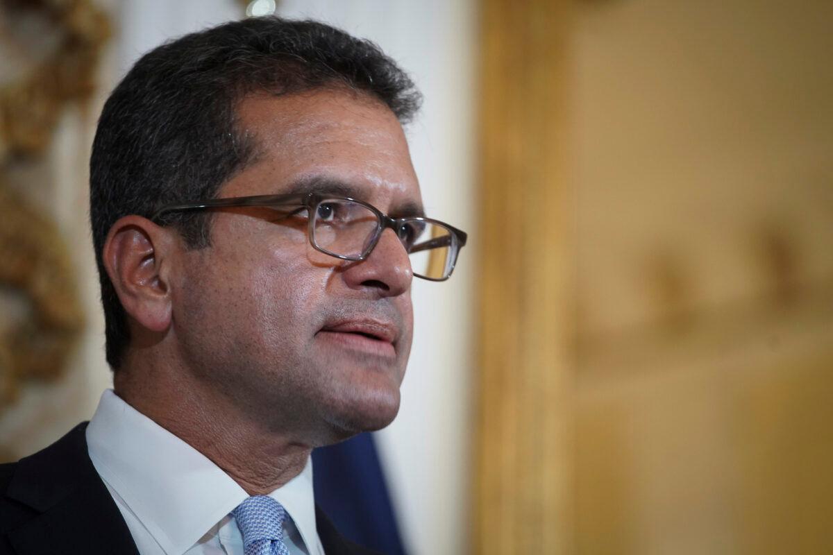 Pedro Pierluisi holds a press conference after being sworn in as Governor of Puerto Rico in San Juan, Puerto Rico, on Aug. 2, 2019. (Eric Rojas/AFP via Getty Images)