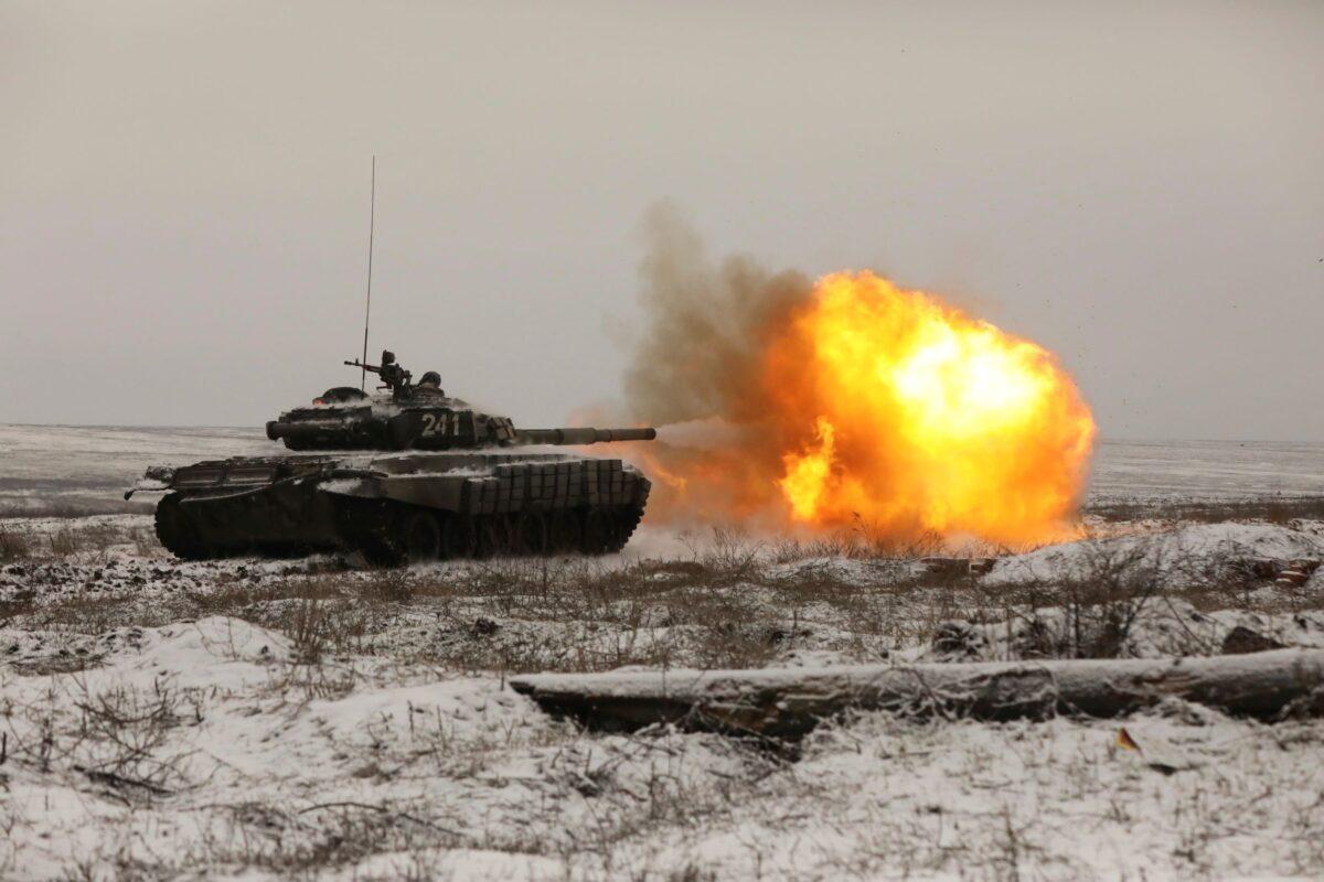 A Russian tank T-72B3 fires as troops take part in drills at the Kadamovskiy firing range in the Rostov region in southern Russia on Jan. 12, 2022. (AP Photo)