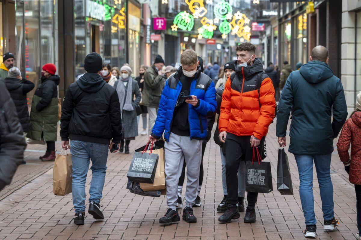 Shoppers are seen along the Kalverstraat, in Amsterdam, Netherlands, on Jan. 15, 2021. (Evert Elzinga/ANP/AFP via Getty Images)