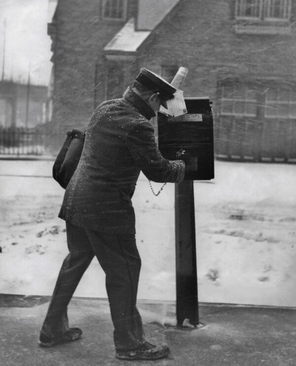 A mailman circa 1950. Until 1950, mail carriers delivered letters to homes in most cities twice daily. (Archive Photos/Getty Images)
