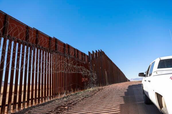 The end of the Obama-era border wall gives way to the taller, 30-foot Trump-era wall on the U.S.–Mexico border near Naco, Ariz., on Dec. 6, 2021. (Charlotte Cuthbertson/The Epoch Times)