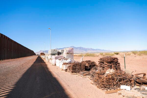 Border wall and road materials sit untouched since January 2021 when President Joe Biden halted all border wall construction, in Cochise County, Ariz., on Dec. 6, 2021. (Charlotte Cuthbertson/The Epoch Times)