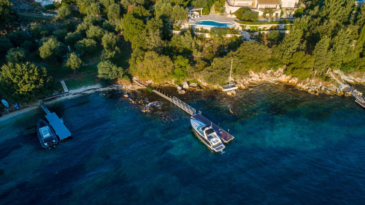A private 62-foot jetty with security cameras has secure mooring with on-site water and electricity hookups. (Courtesy of Sotheby's International Realty - Greece)