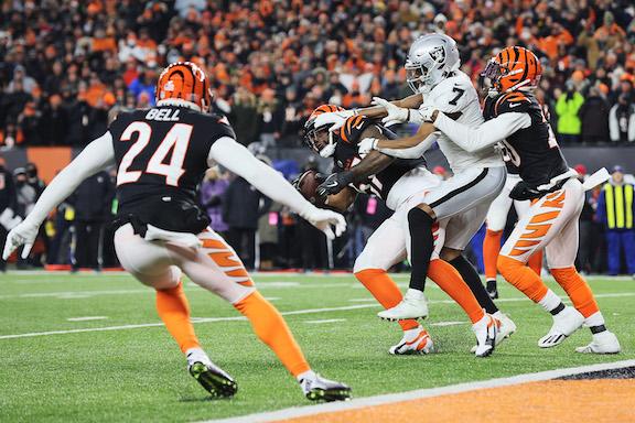 Linebacker Germaine Pratt #57 of the Cincinnati Bengals intercepts a pass intended for wide receiver Zay Jones #7 of the Las Vegas Raiders to seal the Bengals 26-19 win during the AFC Wild Card playoff game at Paul Brown Stadium, in Cincinnati, on Jan. 15, 2022. (Andy Lyons/Getty Images)