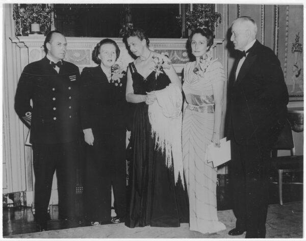 (L–R) Crown Prince Olav of Norway, Princess Juliana of the Netherlands, Eleanor Roosevelt, Crown Princess Martha of Norway, and Thomas J. Watson at the Waldorf-Astoria in 1944. As in the 1945 movie, the hotel has catered to society's elites. U.S. National Archives and Records Administration. (Public Domain)