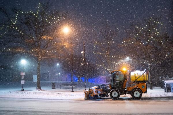 A snowplow clears Main St. in Greenville, S.C. on Jan.16, 2022. (Sean Rayford/Getty Images)