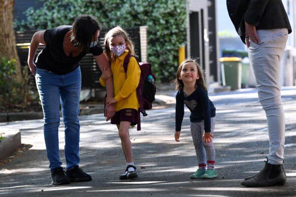 School students return back to school after COVID-19 restrictions were lifted, at Glebe Public School in Sydney, Australia, on Oct. 18, 2021. (AAP Image/Bianca De Marchi)